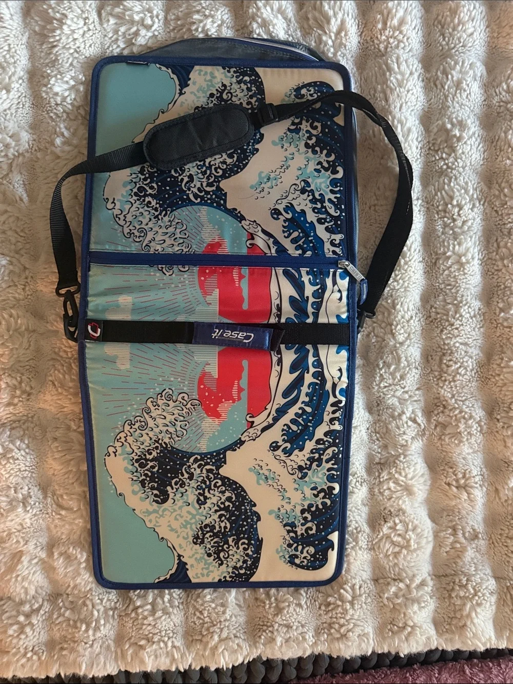 Case it 3 ring binder Japanese Blue Wave.  Like new. Never used.